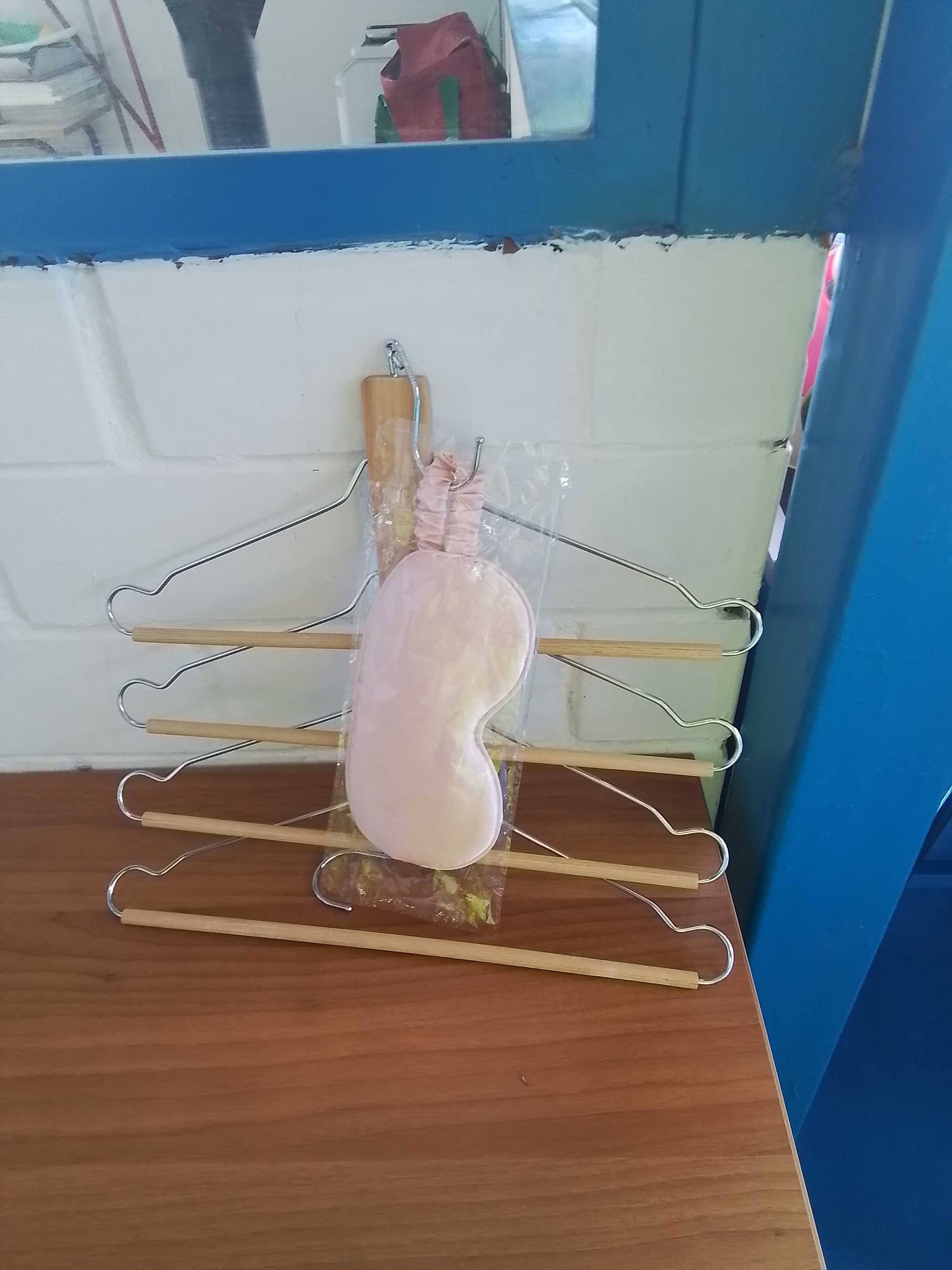 attaccapanni + benda per occhi